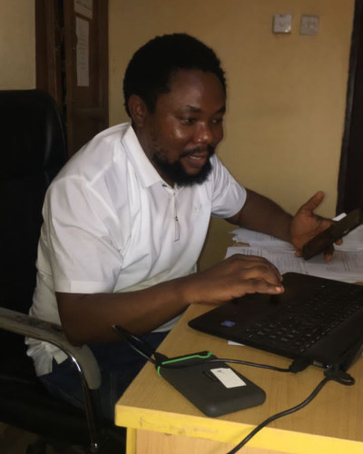 Dr Christopher Oyamienlen